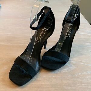 Wild Pair Bethief black heels with ankle straps, very light wear.  size 6.5M